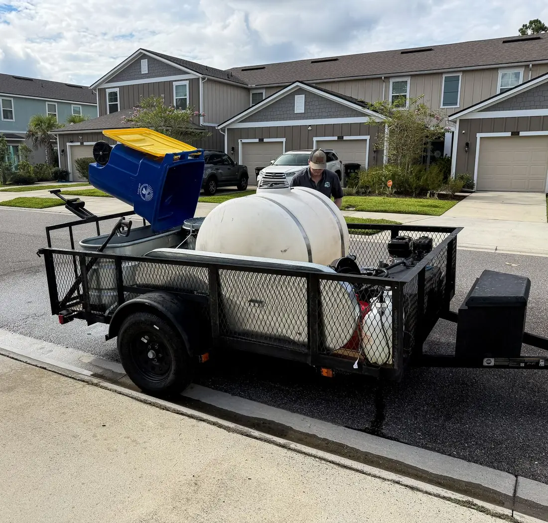 Hill Bros Bin Cleaning current rig — trailer with tanks, equipment, and a bin loaded for cleaning